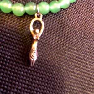 Beaded bracelet with charm